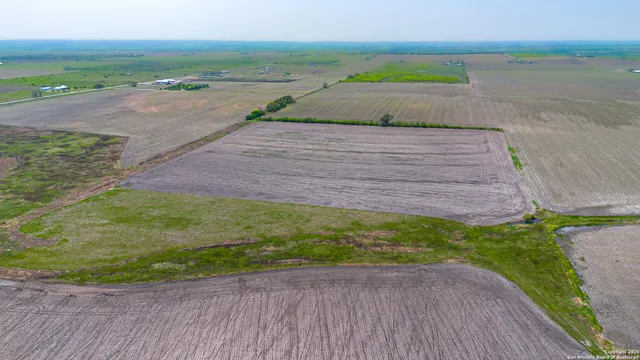 a view of a lake with beach