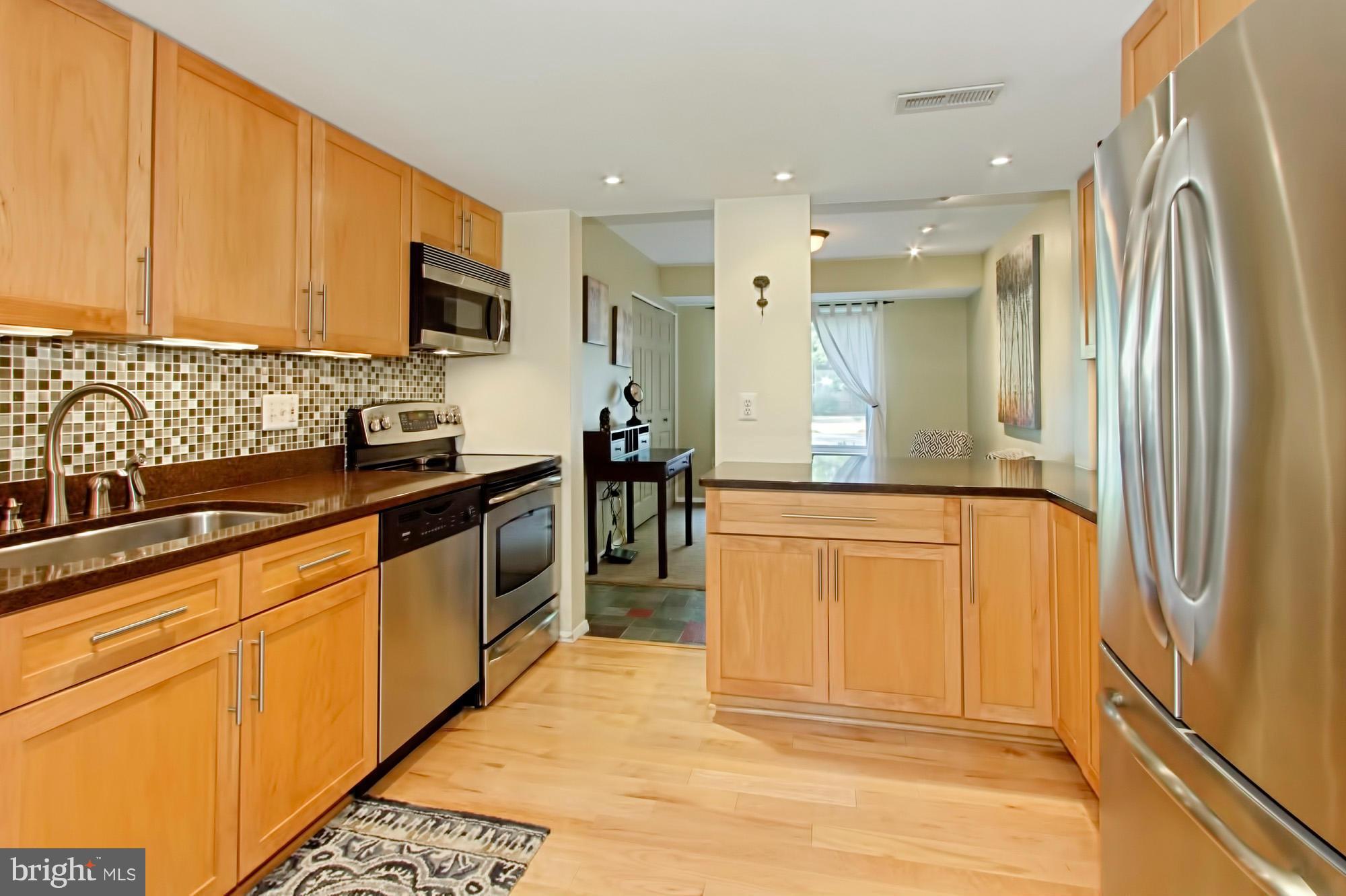 1745 Ivy Oak Square Reston, VA 20190 - Photo 11 of 30 Kitchen Renovated with Maple Cabs and Silestone
