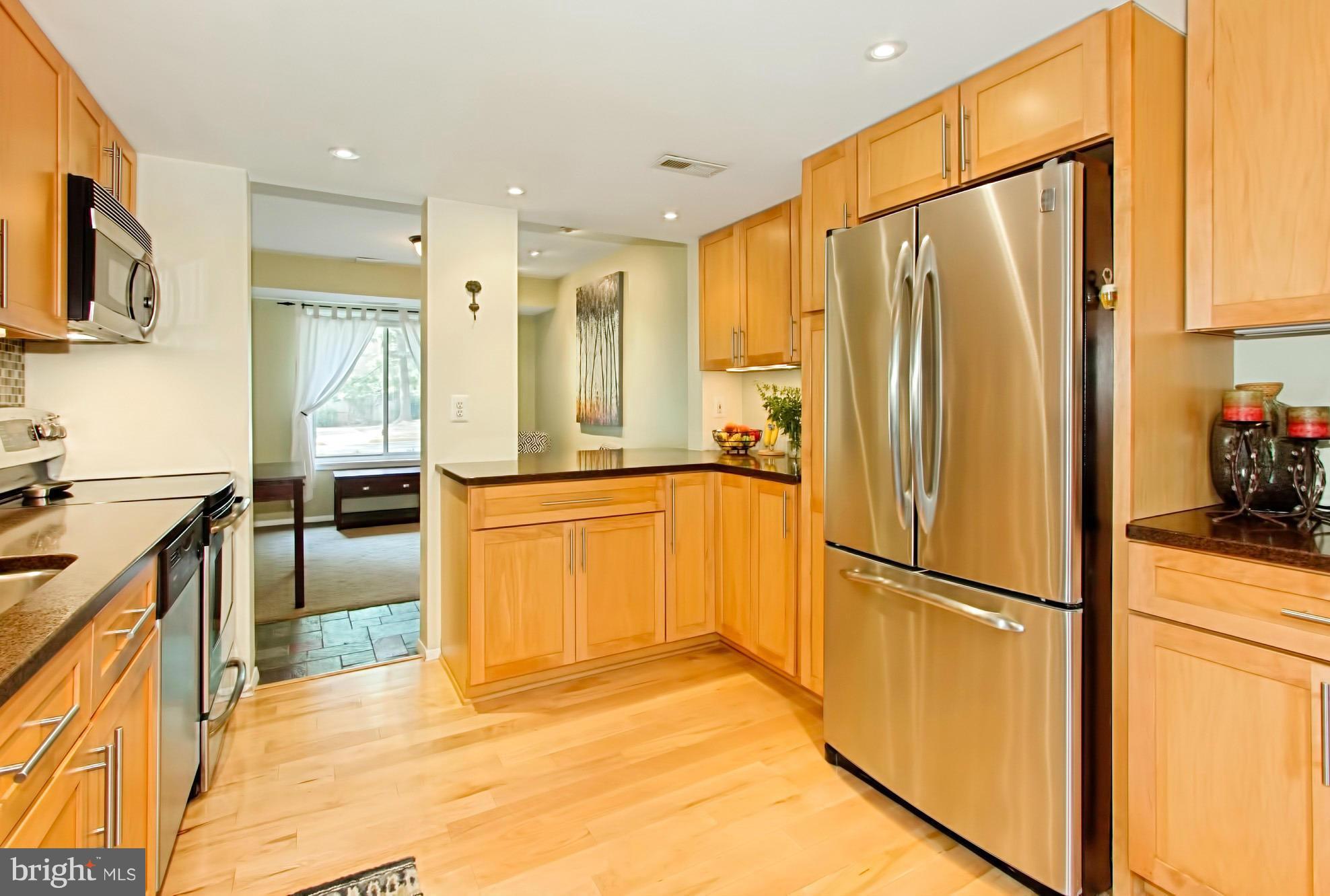 1745 Ivy Oak Square Reston, VA 20190 - Photo 12 of 30 Kitchen with Stainless Steel Appliances