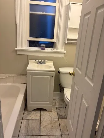 a bathroom with a sink and a toilet