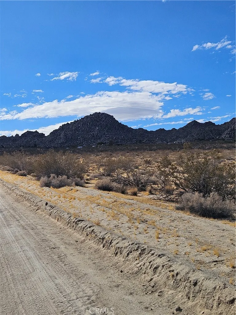 0 California Joshua Tree, CA 92252 - Photo 1 of 4 a view of an ocean beach and mountain