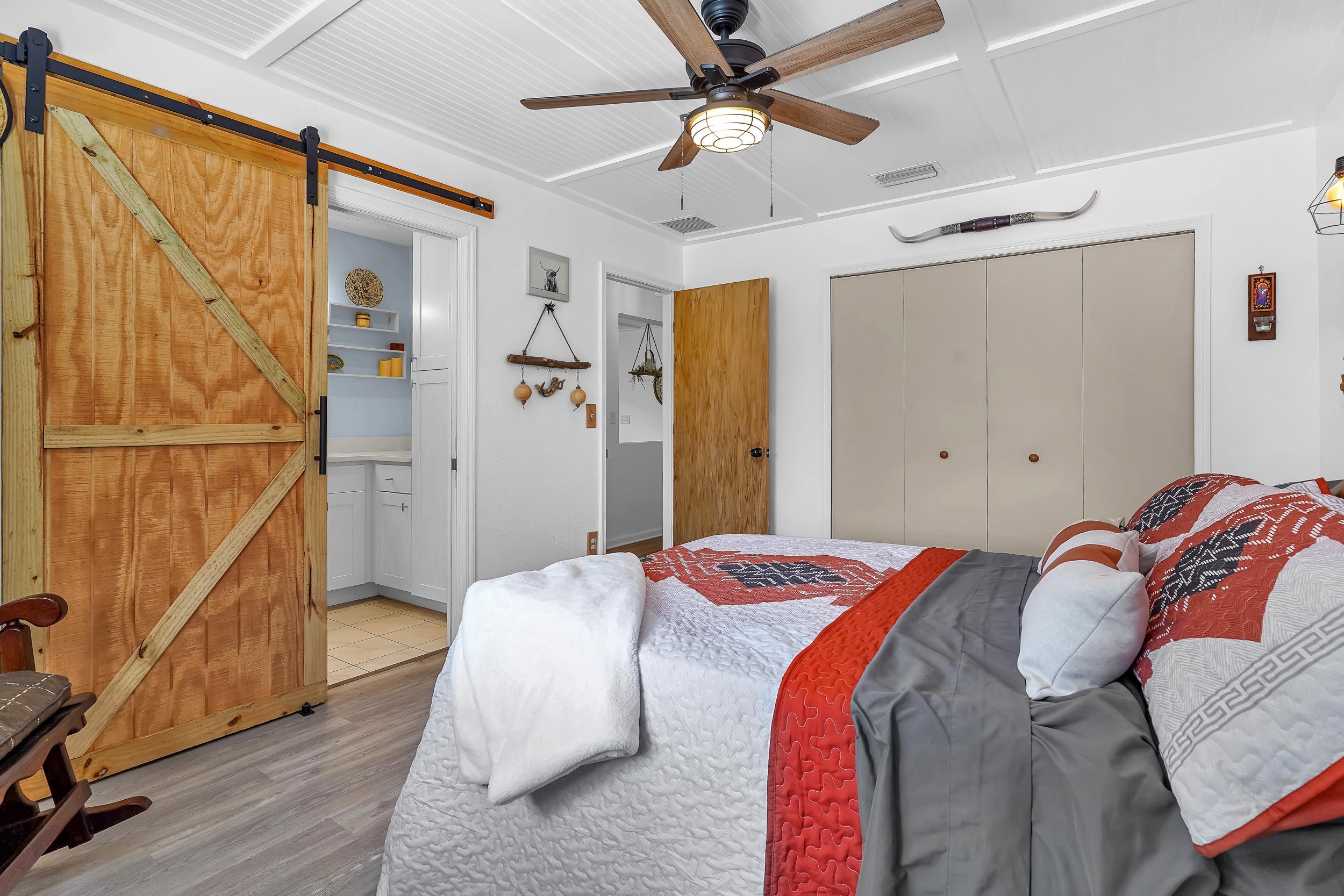 891 Wynfield Circle St. Augustine, FL 32092 - Photo 12 of 37 a bedroom with a bed and a window