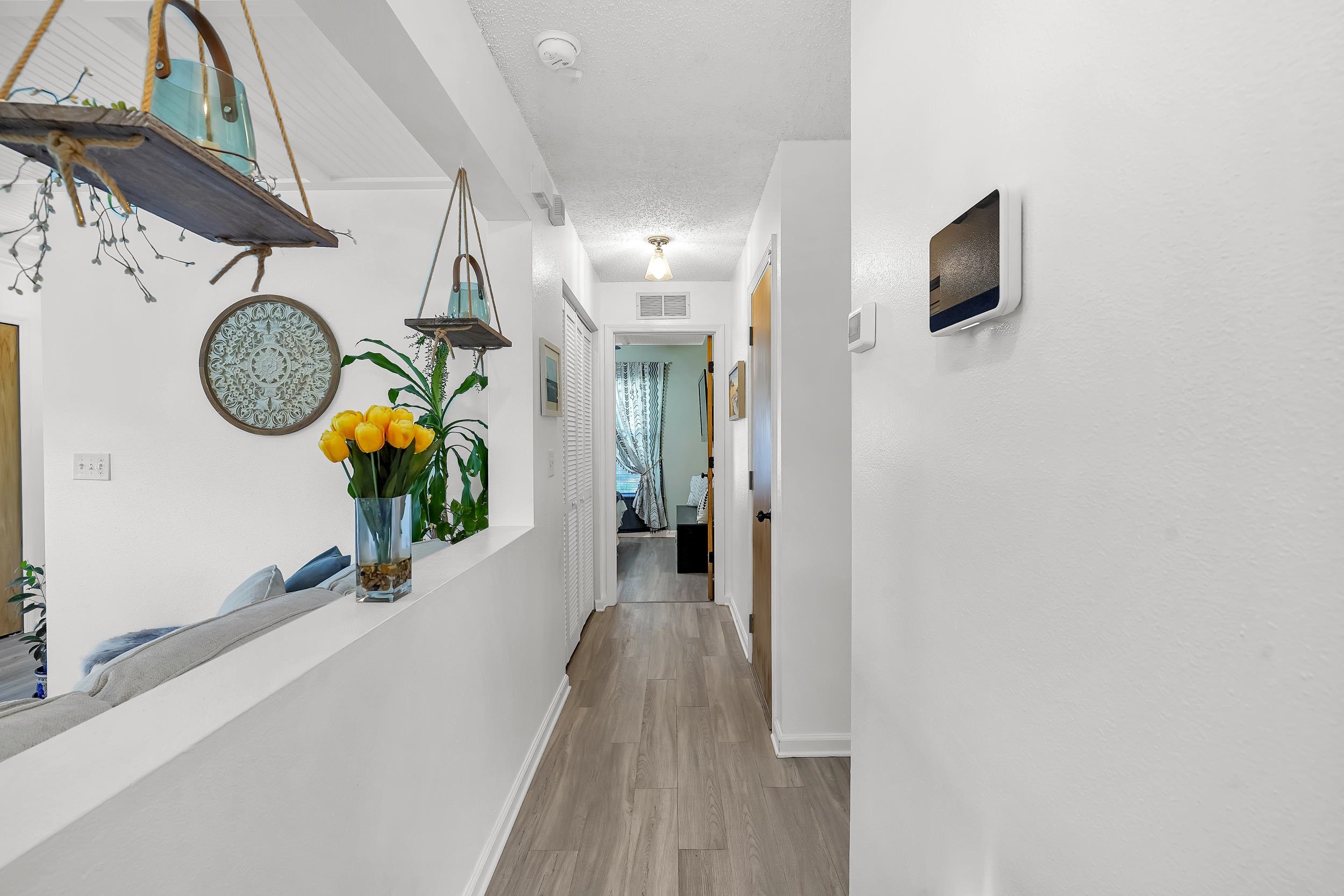 891 Wynfield Circle St. Augustine, FL 32092 - Photo 15 of 37 a hallway with wooden floor