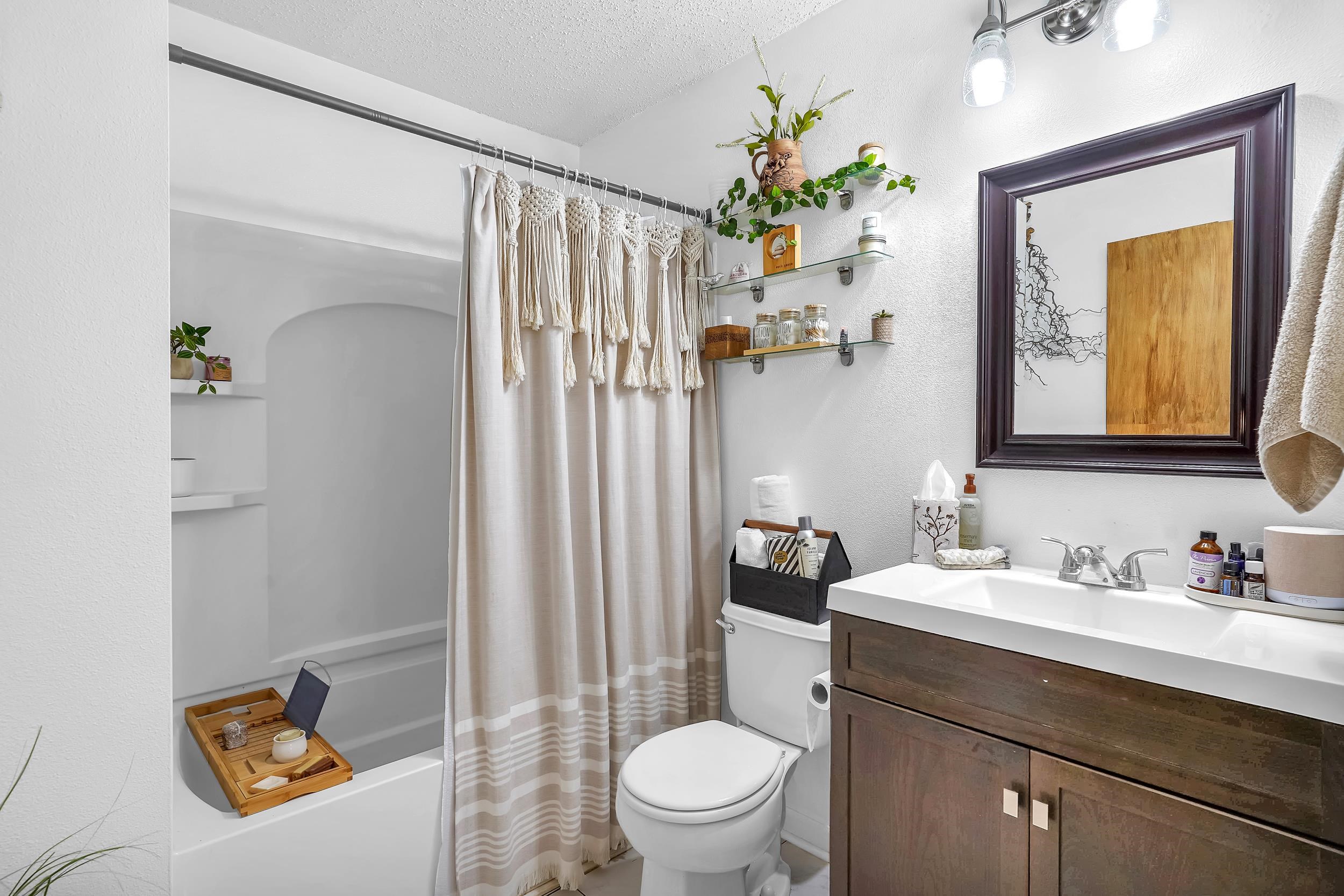 891 Wynfield Circle St. Augustine, FL 32092 - Photo 18 of 37 a bathroom with a sink vanity mirror and toilet