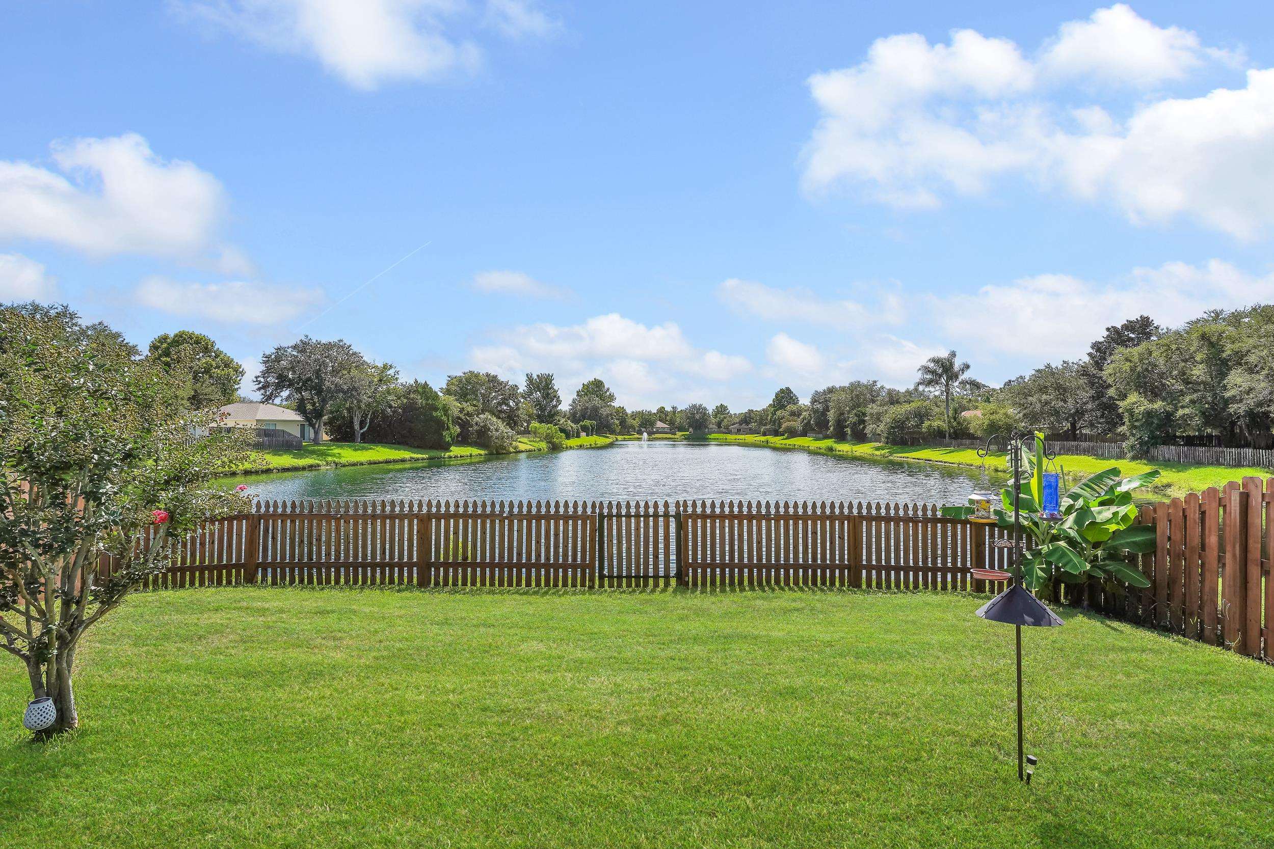 891 Wynfield Circle St. Augustine, FL 32092 - Photo 25 of 37 a view of outdoor space with fenced yard and outdoor seating