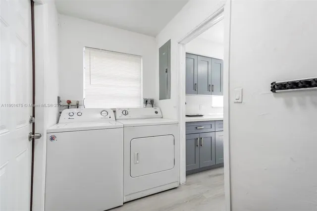 a bathroom with a sink toilet and mirror