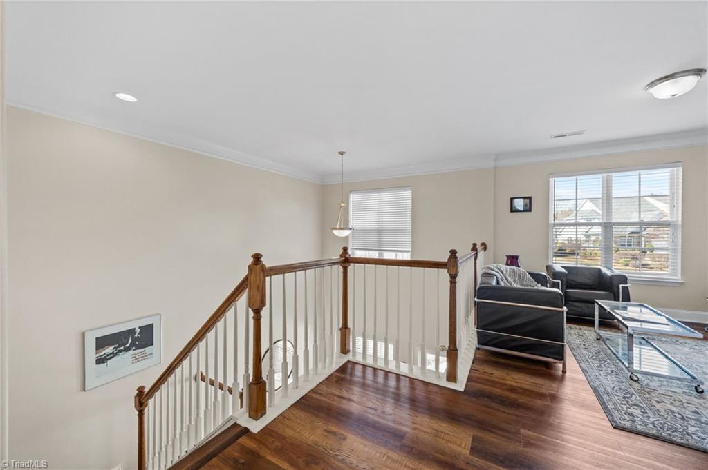 3464 Basalt Court High Point, NC 27265 - Photo 19 of 40 Open railing design adds architectural interest and connects the upper loft to the main living space below.