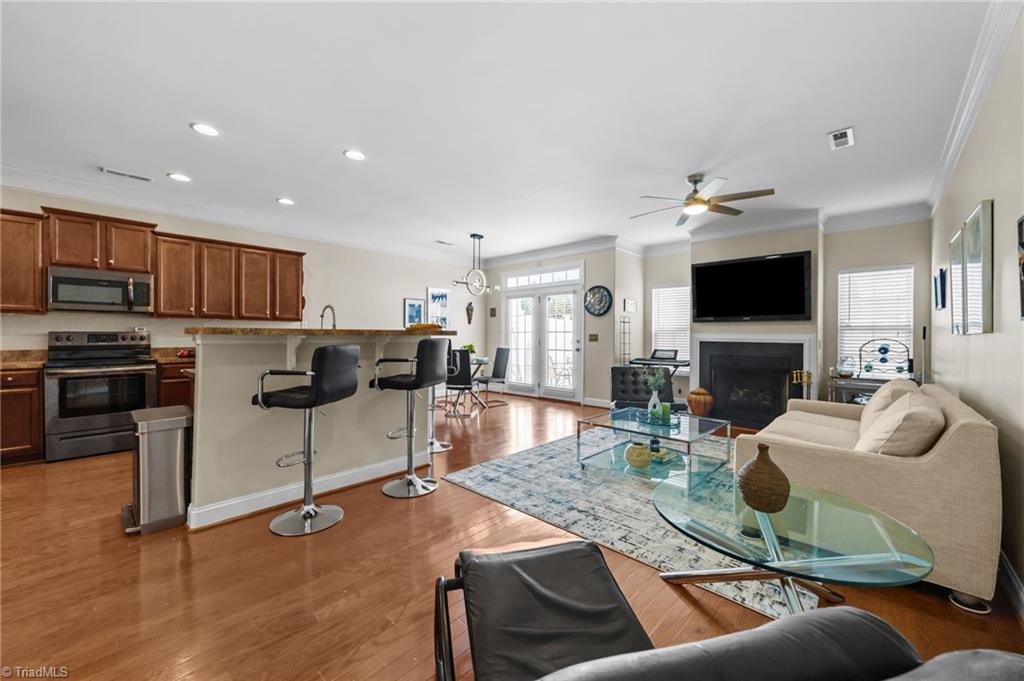 3464 Basalt Court High Point, NC 27265 - Photo 9 of 40 Bright, airy main living area with updated flooring and an easy flow perfect for everyday living or hosting guests.