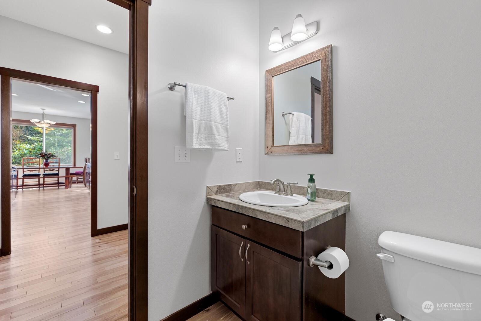 18610 Russian Road Arlington, WA 98223 - Photo 20 of 40 a bathroom with a toilet sink and mirror