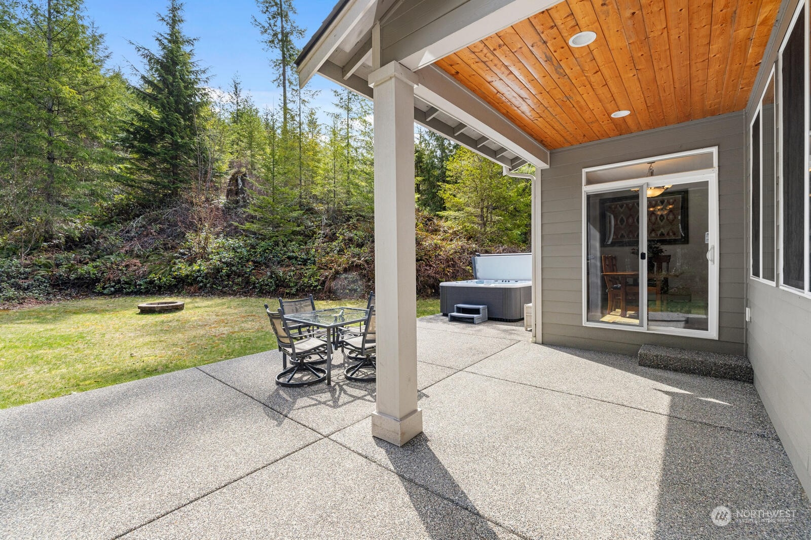 18610 Russian Road Arlington, WA 98223 - Photo 34 of 40 a view of a patio with chairs and table in the patio