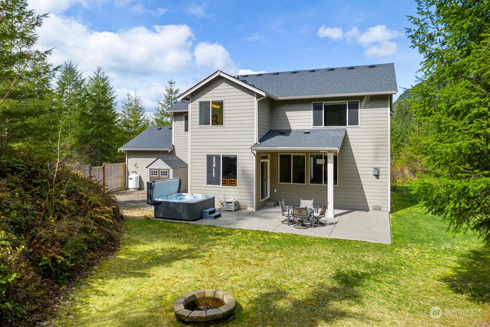 18610 Russian Road Arlington, WA 98223 - Photo 36 of 40 a front view of a house with sitting space
