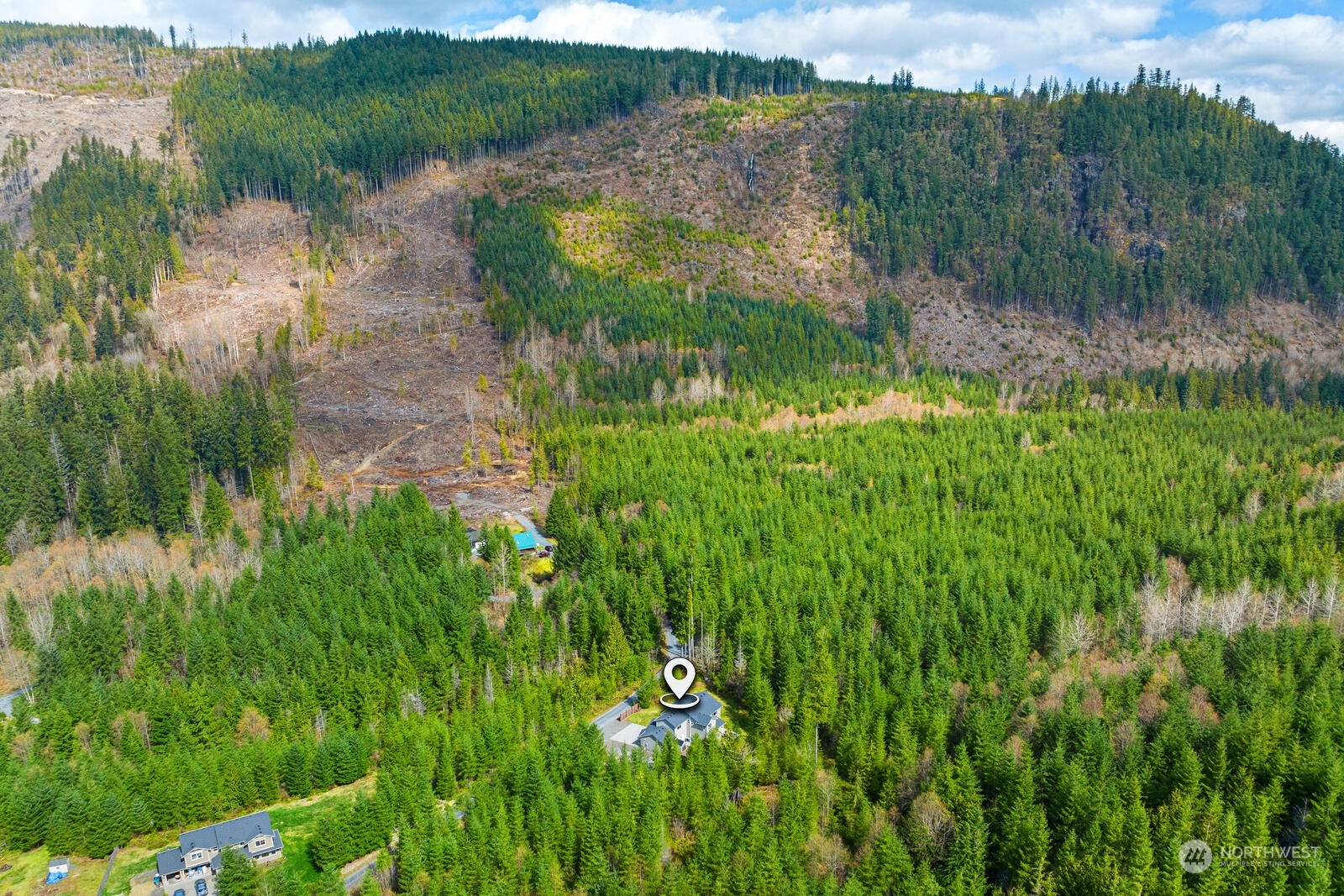 18610 Russian Road Arlington, WA 98223 - Photo 39 of 40 a view of a lake with a yard