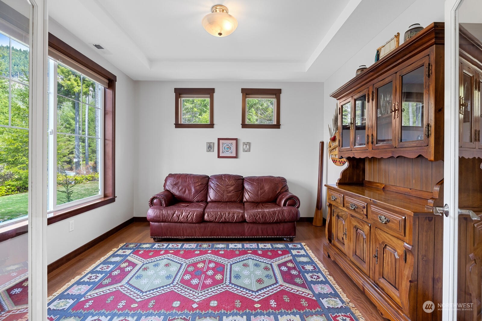 18610 Russian Road Arlington, WA 98223 - Photo 6 of 40 a living room with furniture and a rug