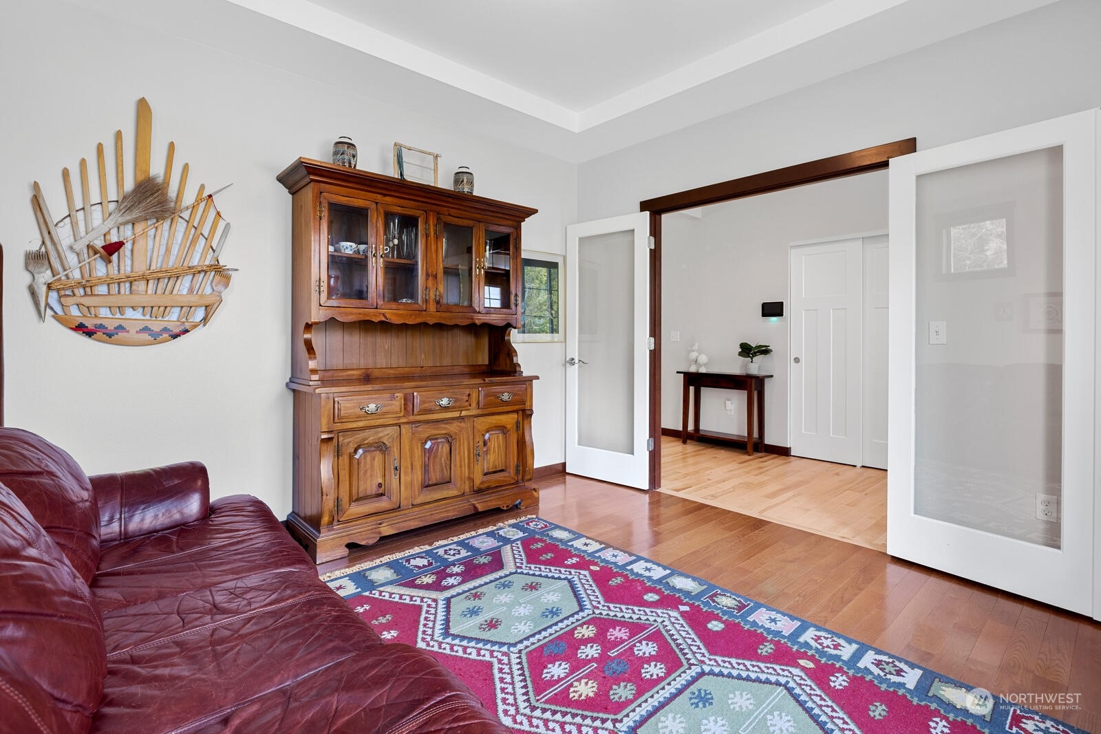 18610 Russian Road Arlington, WA 98223 - Photo 7 of 40 a living room with furniture and a wooden floor