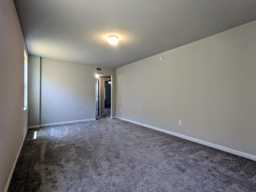196 Martha Lane Kyle, TX 78640 - Photo 11 of 30 a view of an empty room