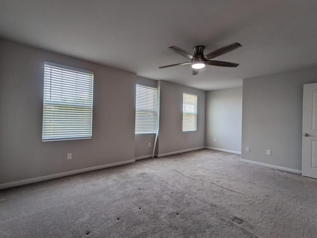 196 Martha Lane Kyle, TX 78640 - Photo 13 of 30 a view of an empty room with a window