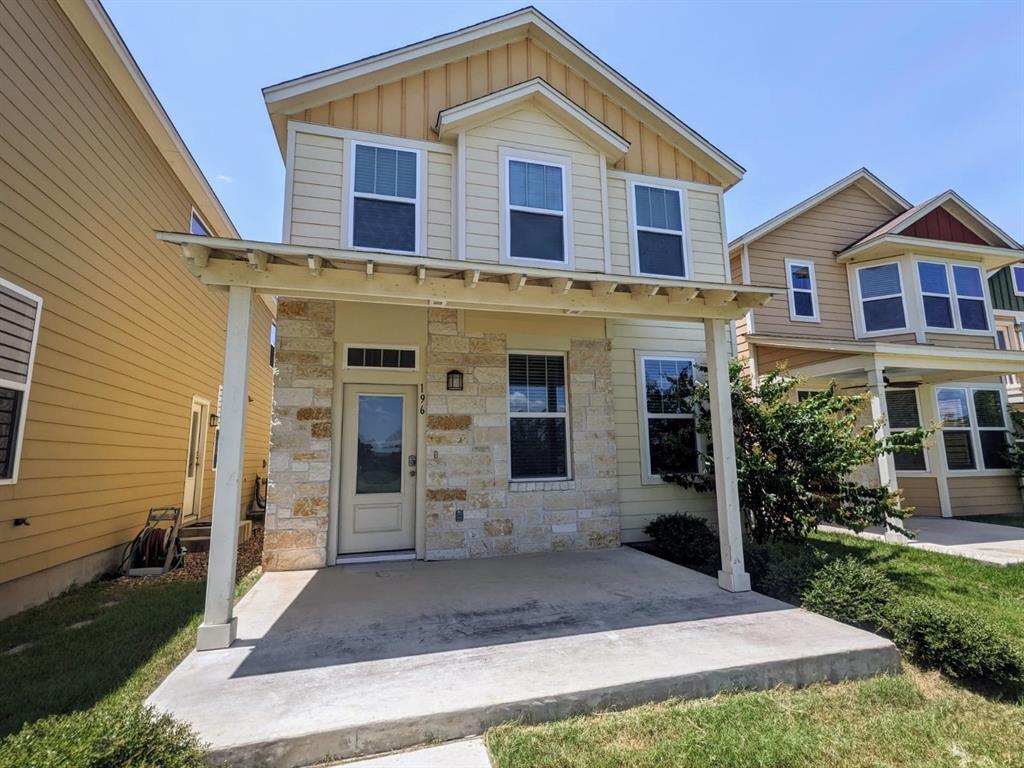 196 Martha Lane Kyle, TX 78640 - Photo 2 of 30 a front view of a house with garden
