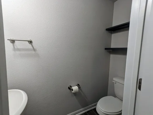 a bathroom with a toilet
