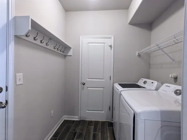 a utility room with dryer and washer