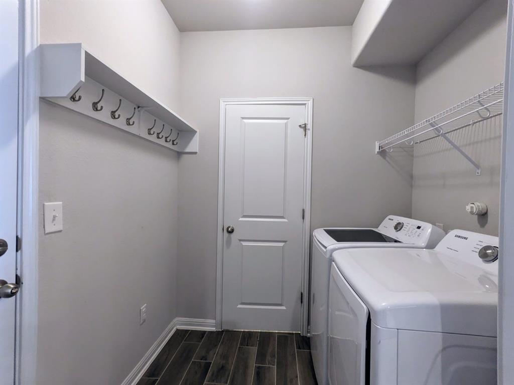 196 Martha Lane Kyle, TX 78640 - Photo 24 of 30 a utility room with dryer and washer