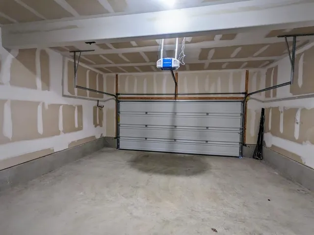 a view of an empty room with racks on the wall