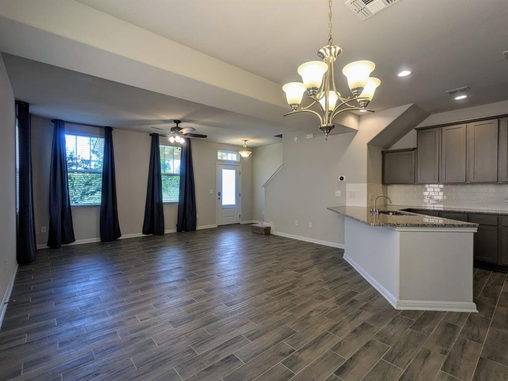196 Martha Lane Kyle, TX 78640 - Photo 6 of 30 a view of a house with a kitchen