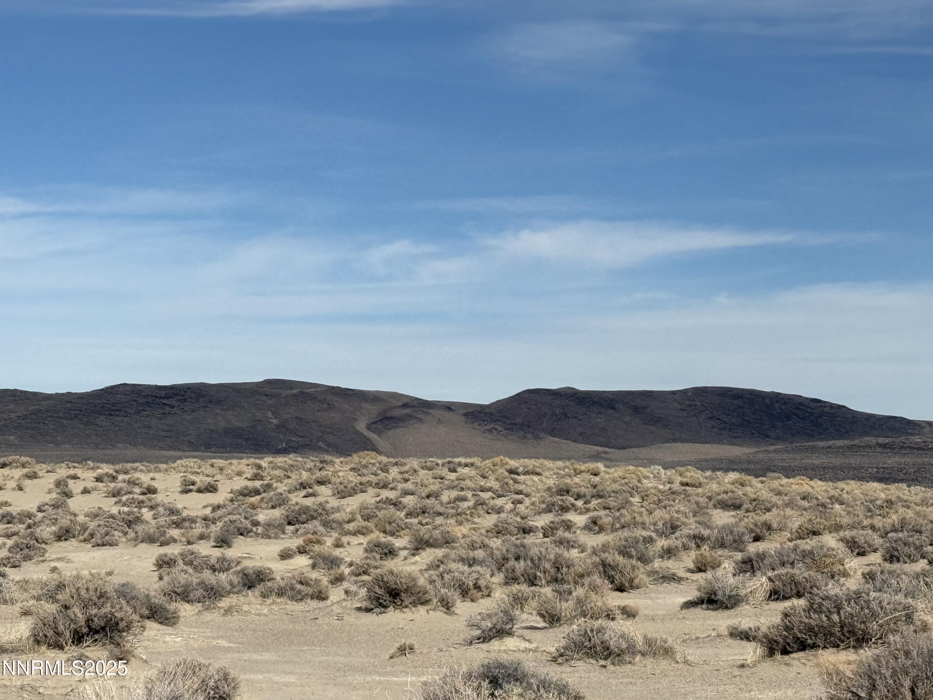 5285 East 3rd Street Silver Springs, NV 89429 - Photo 5 of 5 a view of mountain with sunset in background