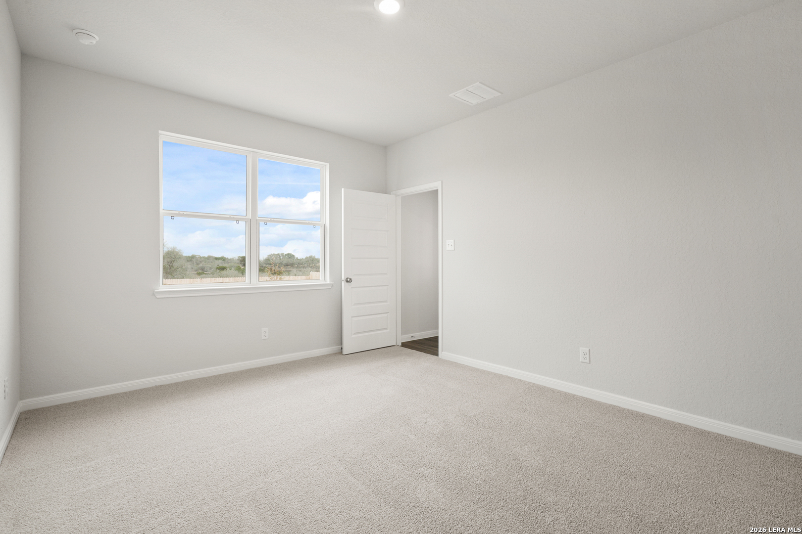 13631 Helton Pass St. Hedwig, TX 78152 - Photo 11 of 33 an empty room with window