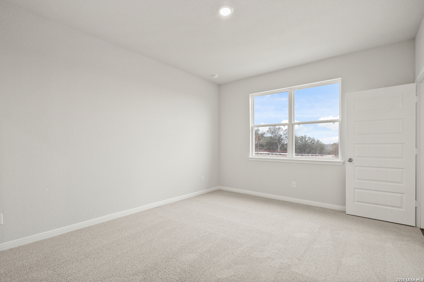 13631 Helton Pass St. Hedwig, TX 78152 - Photo 12 of 33 an empty room with windows and closet