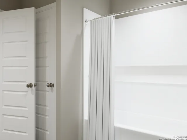 a view of a room with racks on the wall