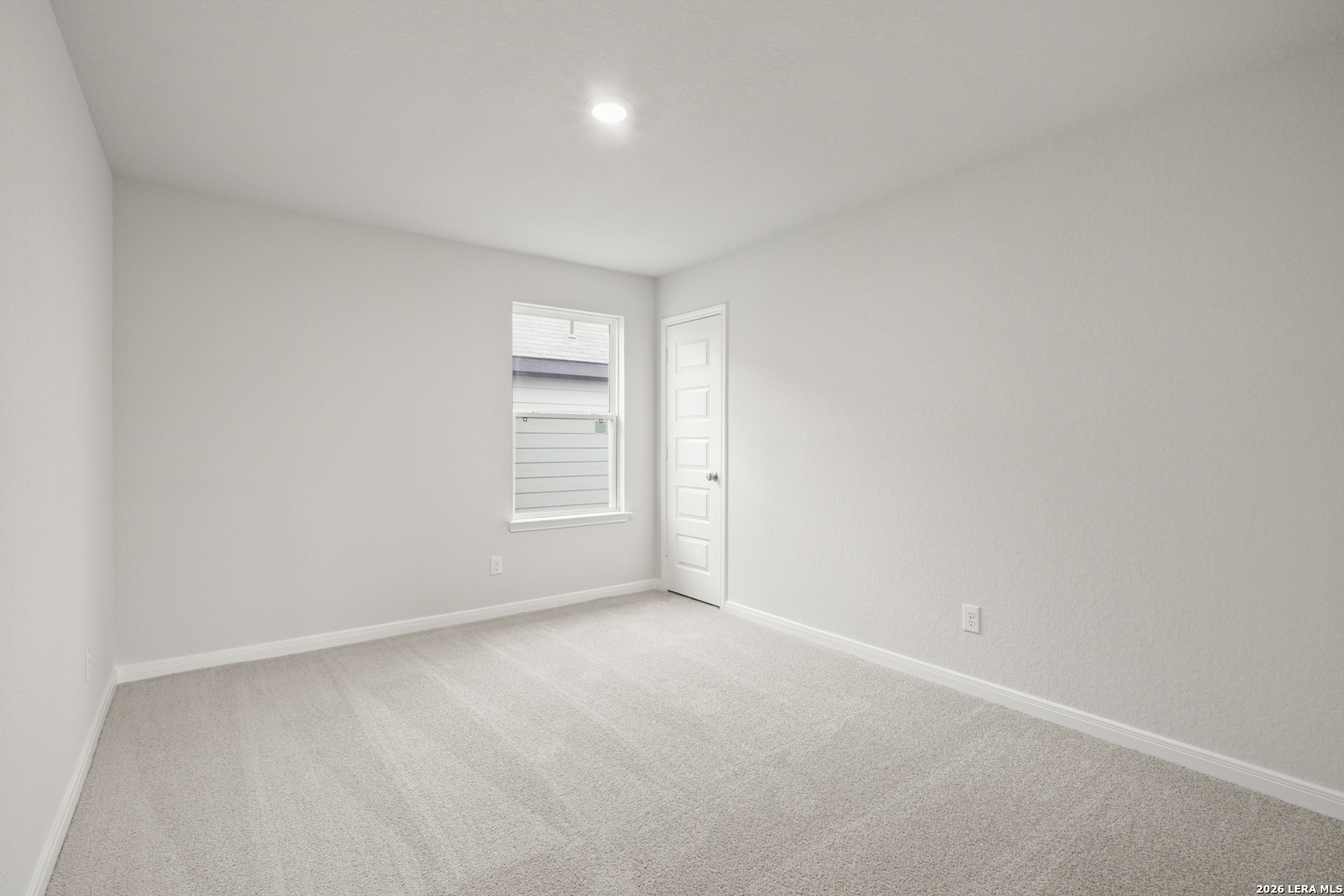 13631 Helton Pass St. Hedwig, TX 78152 - Photo 17 of 33 a view of an empty room and a window
