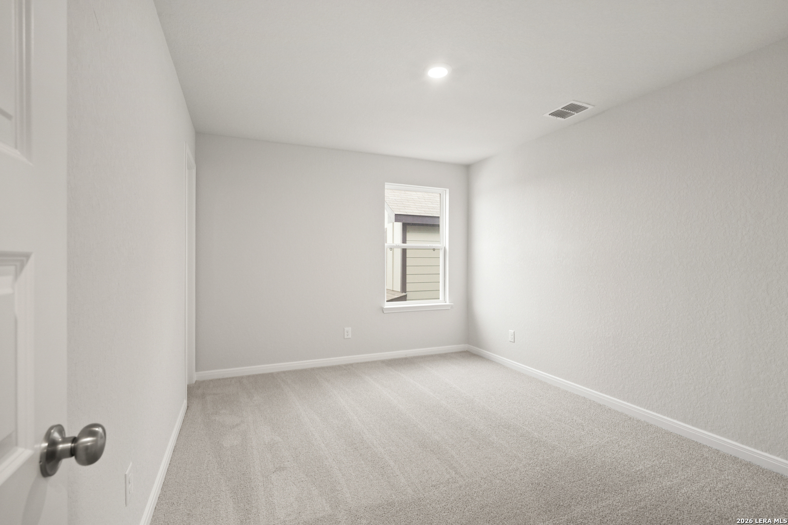 13631 Helton Pass St. Hedwig, TX 78152 - Photo 18 of 33 a view of an empty room with a window