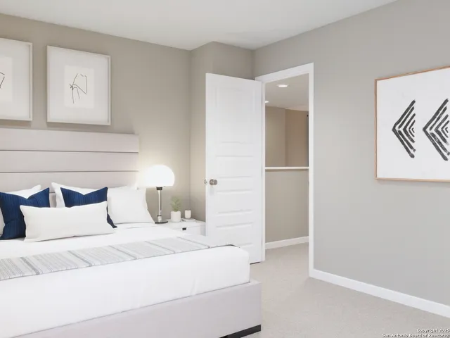 a bedroom with bed and a window