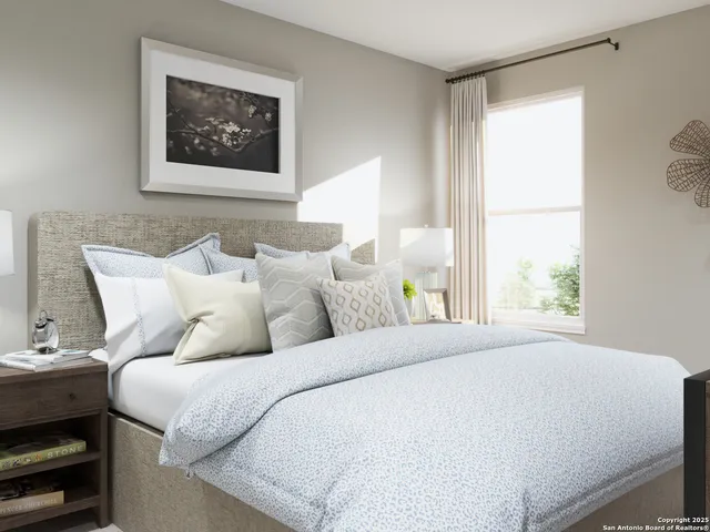 a bedroom with a bed and a dresser