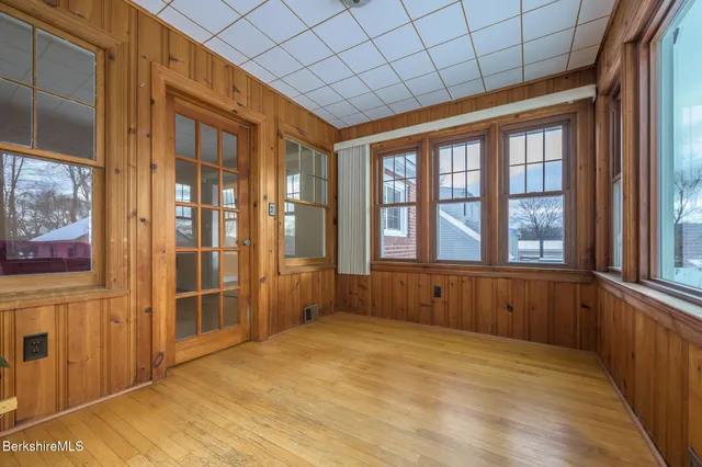 a view of a flower arrangement in front of a house