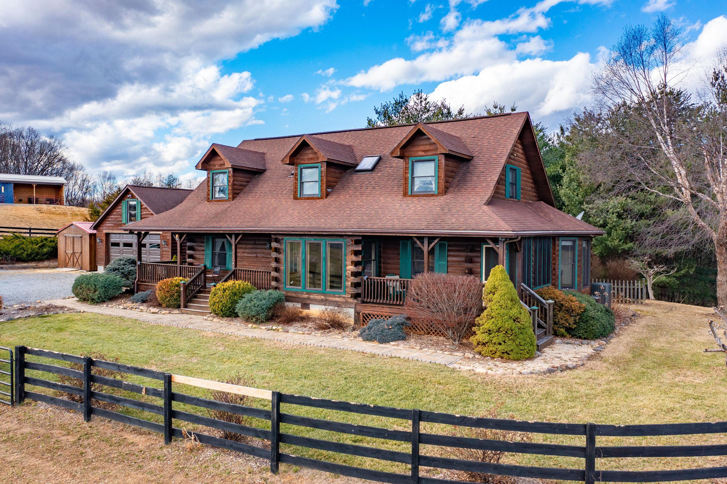 80 Good View Drive Raphine, VA 24472 - Photo 1 of 59 a front view of a house with garden