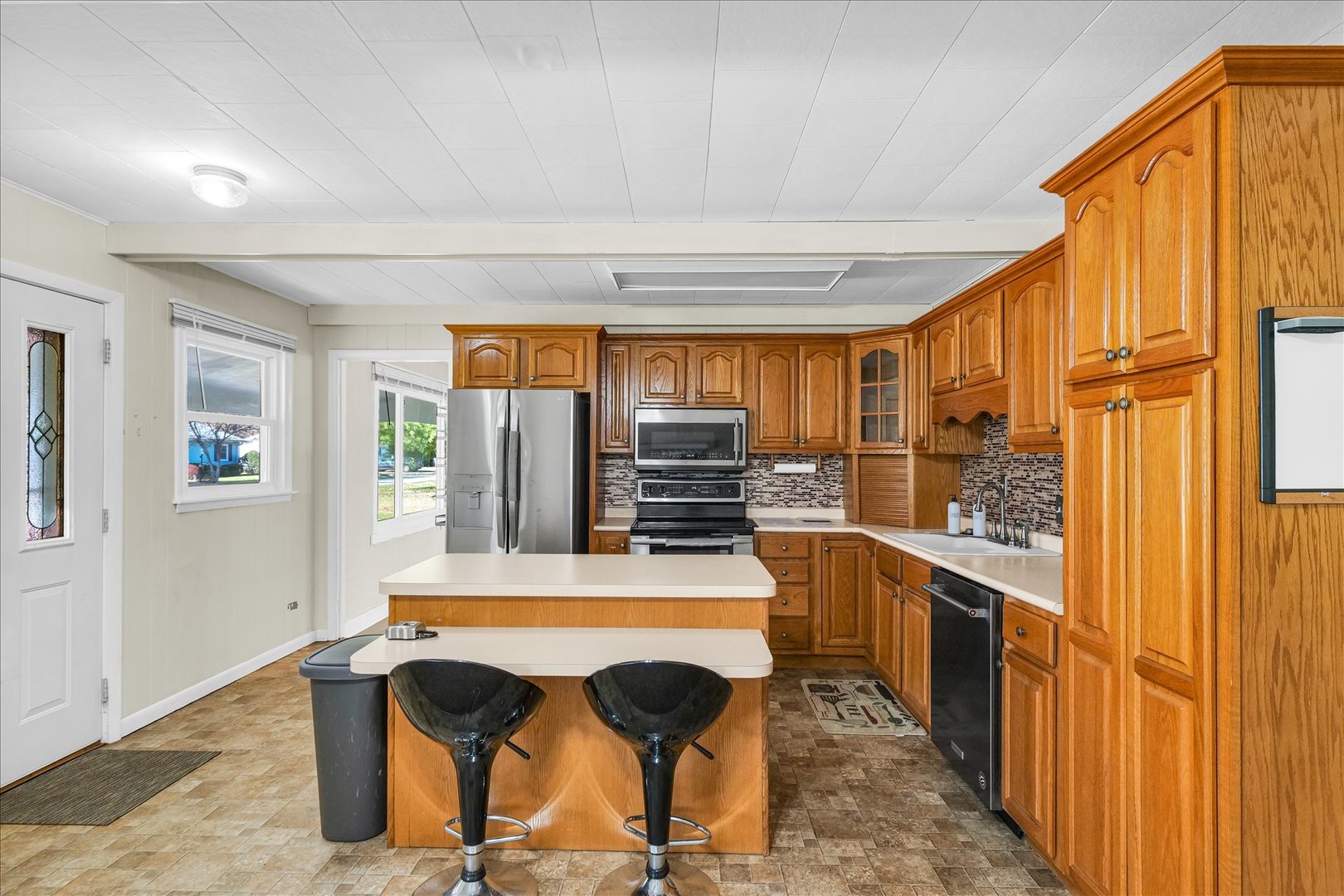 101 Delmar Catlin, IL 61817 - Photo 11 of 32 a room with table chairs and window
