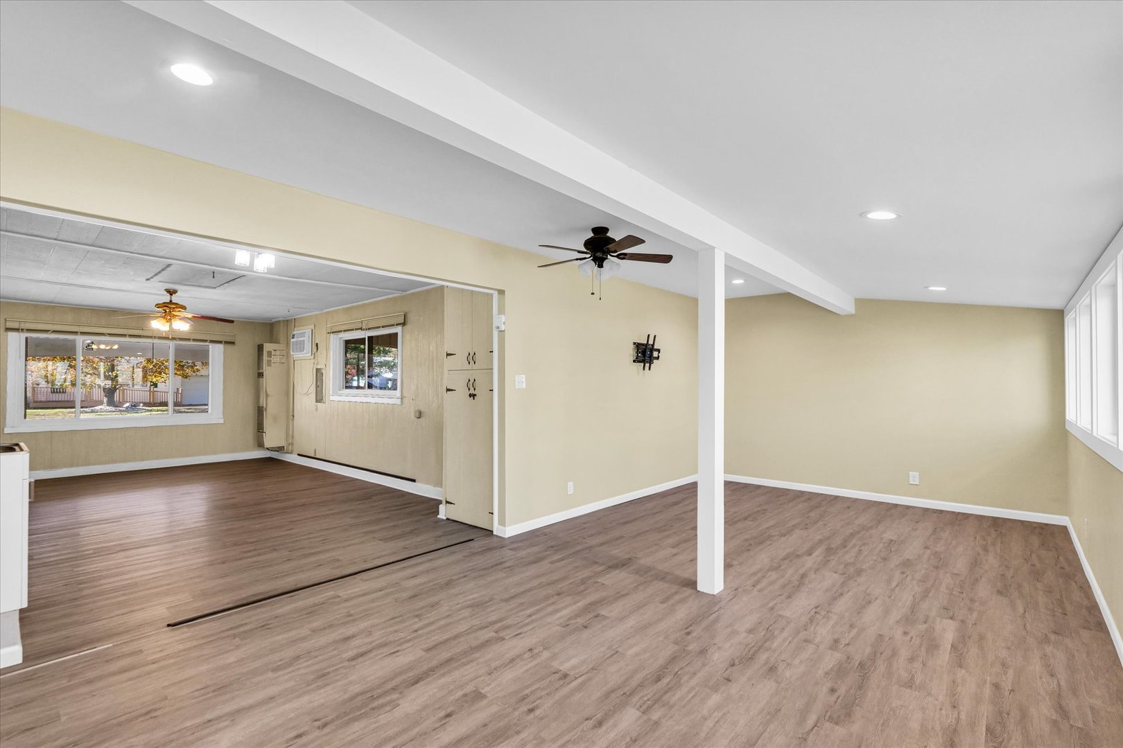 101 Delmar Catlin, IL 61817 - Photo 19 of 32 wooden floor in an empty room with a window