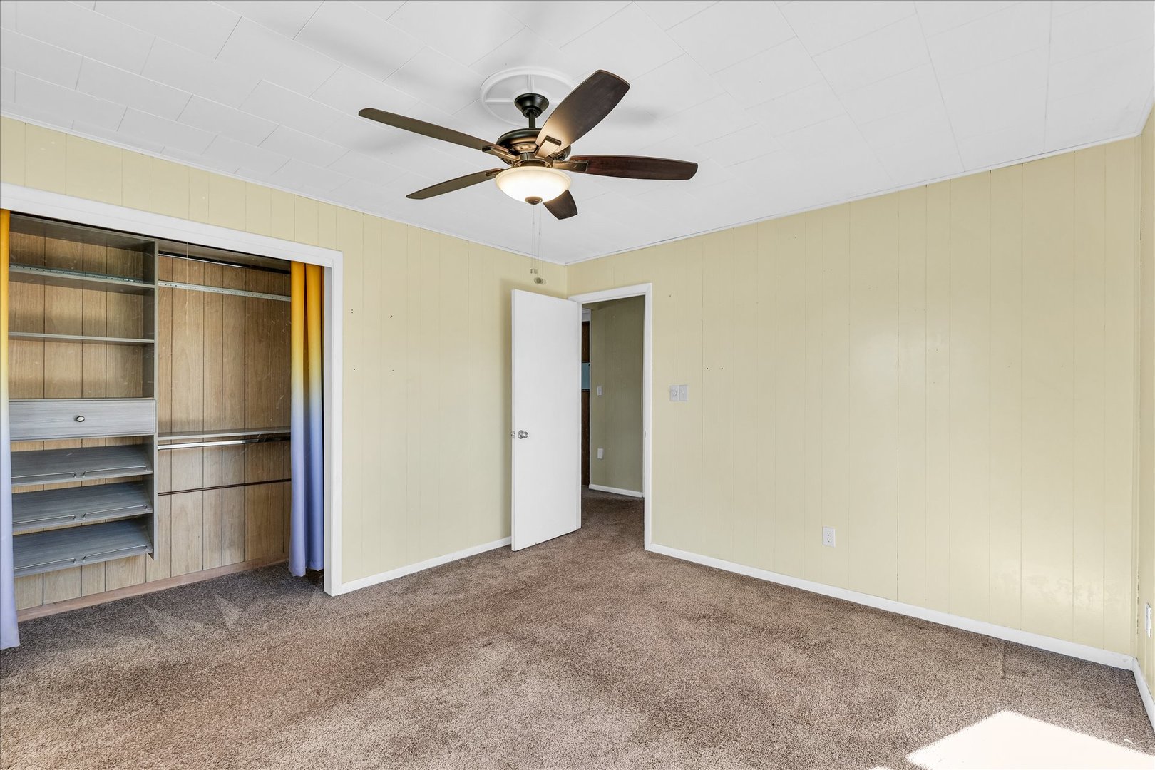 101 Delmar Catlin, IL 61817 - Photo 23 of 32 a view of empty room with window and ceiling fan
