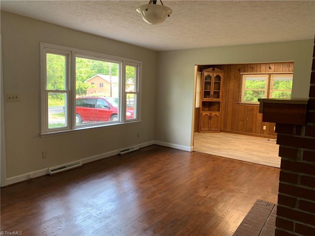 290 Welch Road Mount Airy, NC 27030 - Photo 3 of 27 Living room with refinished hardwood floors