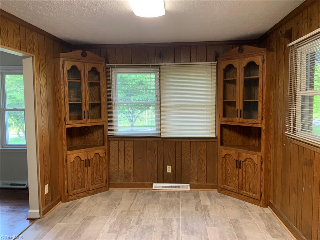 290 Welch Road Mount Airy, NC 27030 - Photo 8 of 27 Dining room with oak corner cabinets