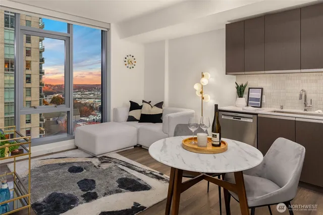 a living room with furniture and a rug