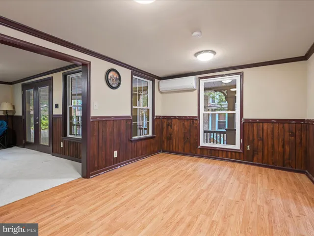 a living room with furniture and window