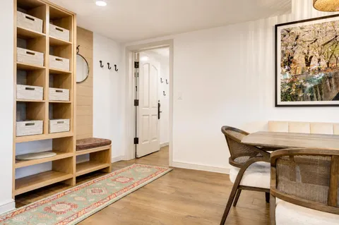 a view of a livingroom with furniture and window