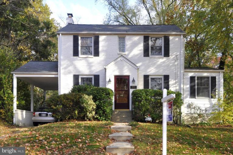 10003 Raynor Road Silver Spring, MD 20901 - Photo 1 of 28 a front view of a house with garden