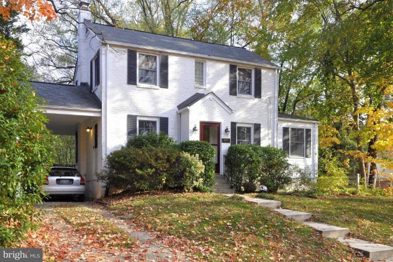10003 Raynor Road Silver Spring, MD 20901 - Photo 2 of 28 a front view of a house with garden