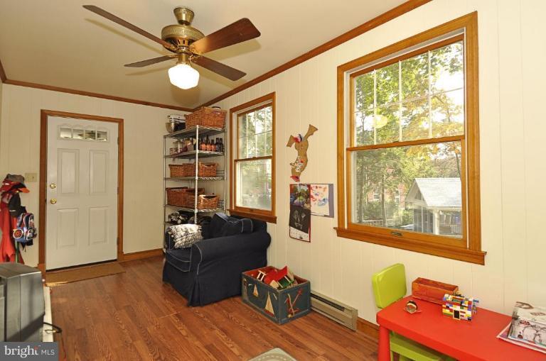 10003 Raynor Road Silver Spring, MD 20901 - Photo 15 of 28 a living room with furniture and a large window
