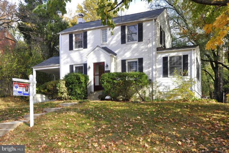 10003 Raynor Road Silver Spring, MD 20901 - Photo 3 of 28 a front view of a house with garden