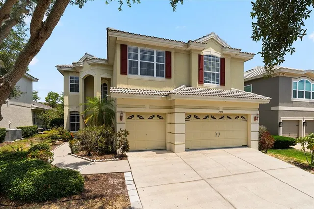 a front view of a house with a garage