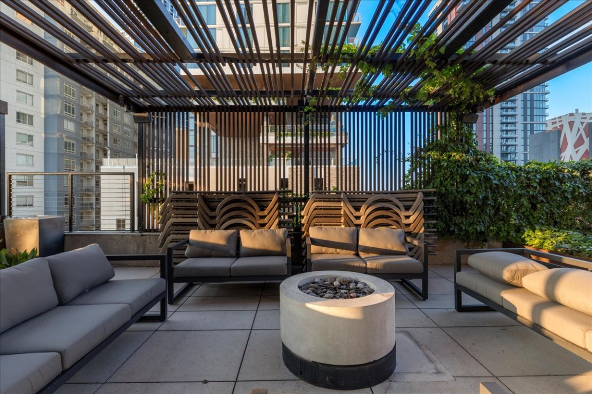 70 Rainey Street, Unit 1503 Austin, TX 78701 - Photo 19 of 30 View of patio featuring an outdoor living space with a fire pit and a pergola